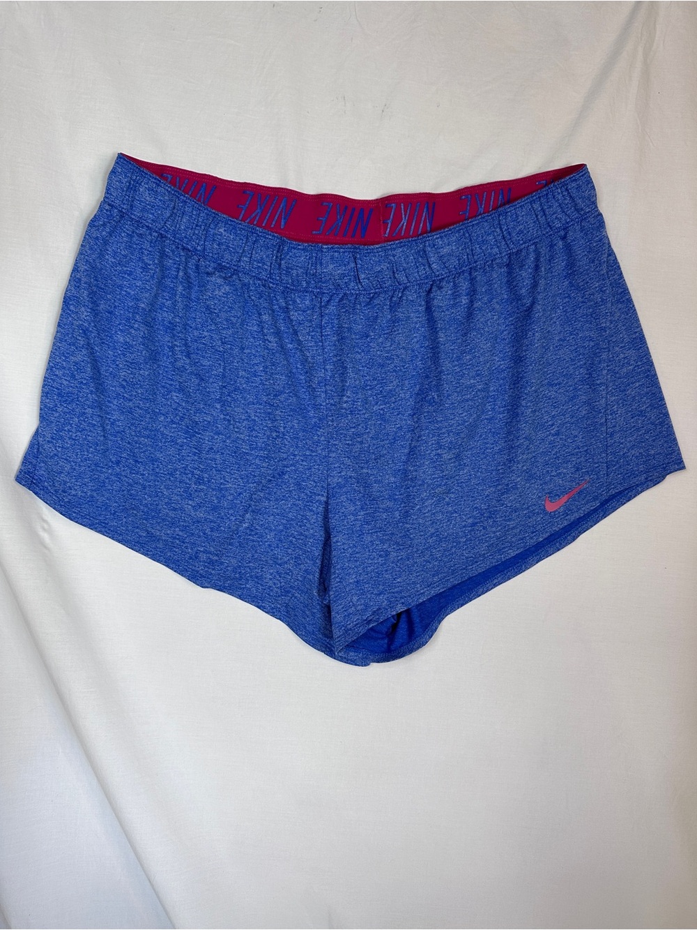 Nike Women's Royal Blue Athletic Shorts with Pink Logo
